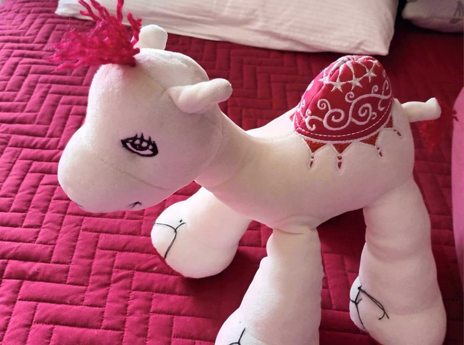 Peluche dromedário branco