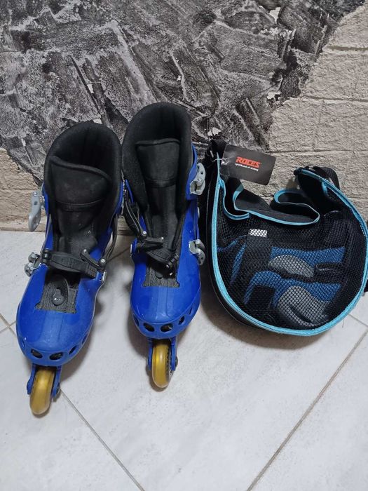 Продам ролики с наколенникамии