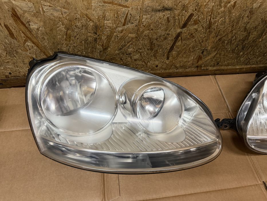 Передні фари Hella Volkswagen Golf 5 Jetta 03-09 ціна за штуку
