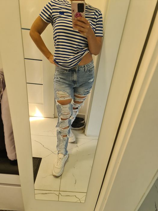 Spodnie jeansowe z dziurami