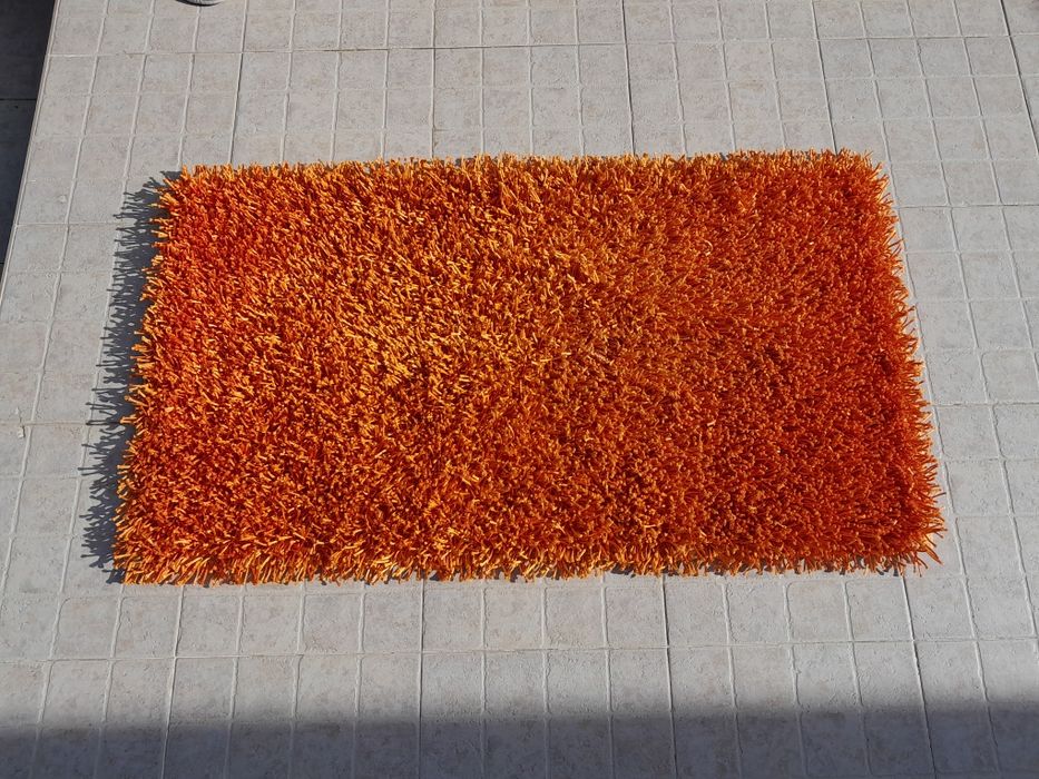 Carpetes e tapetes de fios altos