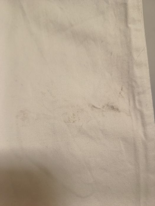 Beżowe kremowe spodnie w modelu chinos