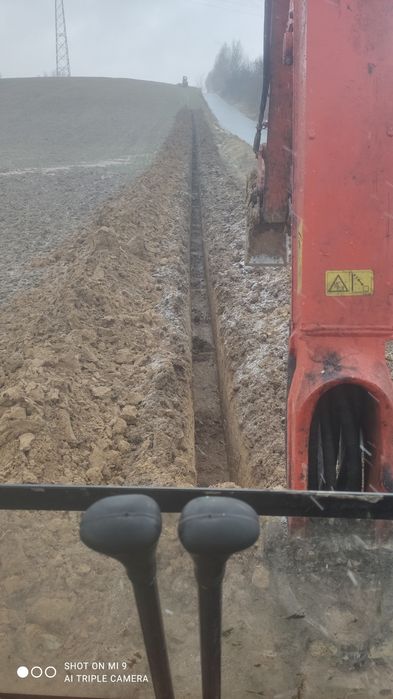 Usługi koparko-ladowarką, minikoparka, roboty ziemne