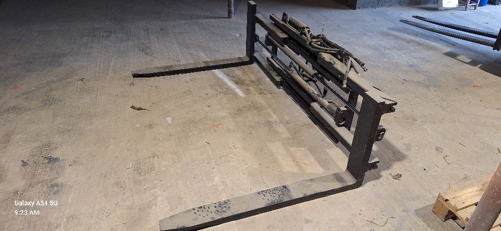 Pozycjonery KAUP chwytak ścisk CASCADE paletyzer wózek widłowy