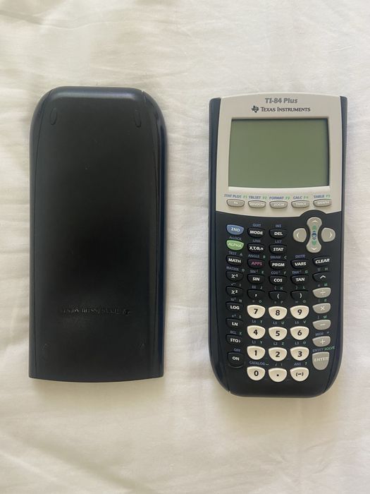 Calculadora  Texas TI 84 Plus esta como nova