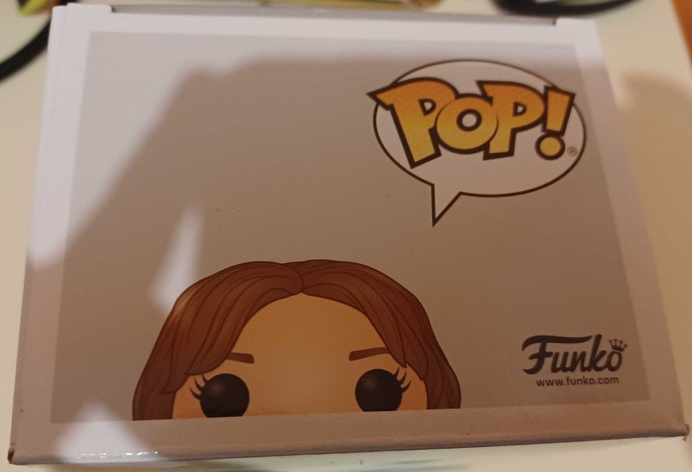 Funko Pop Hermione holding gift