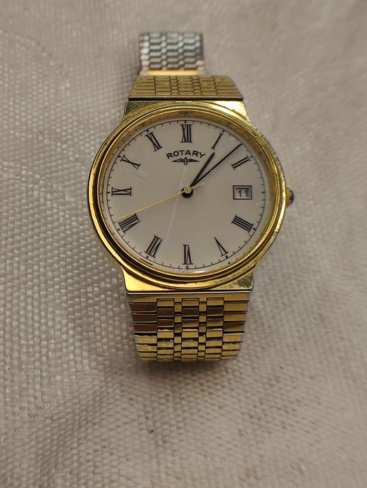 Rotary годинник наручний .позолота.