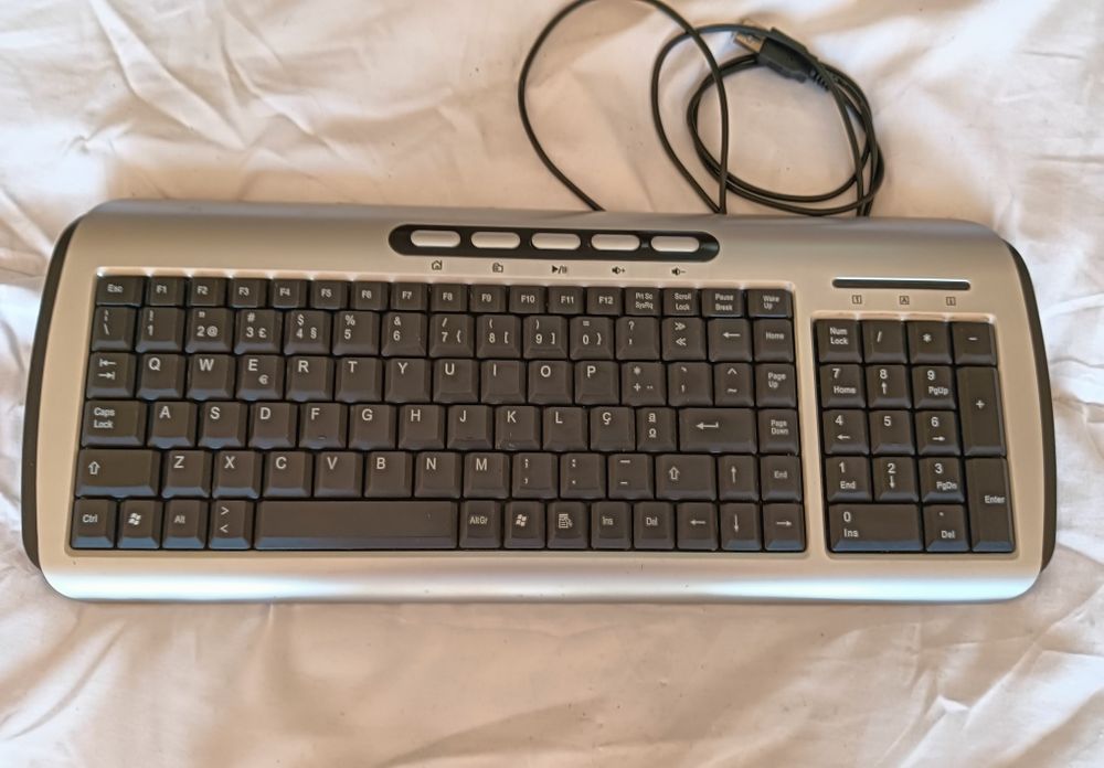 Teclado sem fios Logitech Cordless Desktop EX 110