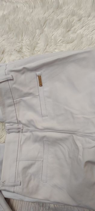 Spodnie damskie białe eleganckie S