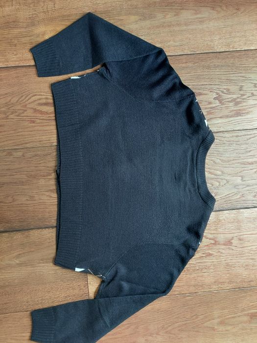 Krótki sweterek w romby marki H&M