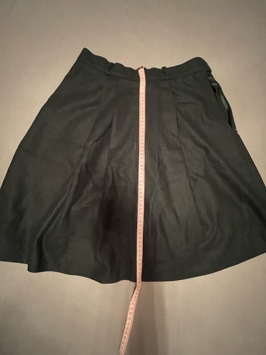 Спідниця темно-зеленого кольору зі складками