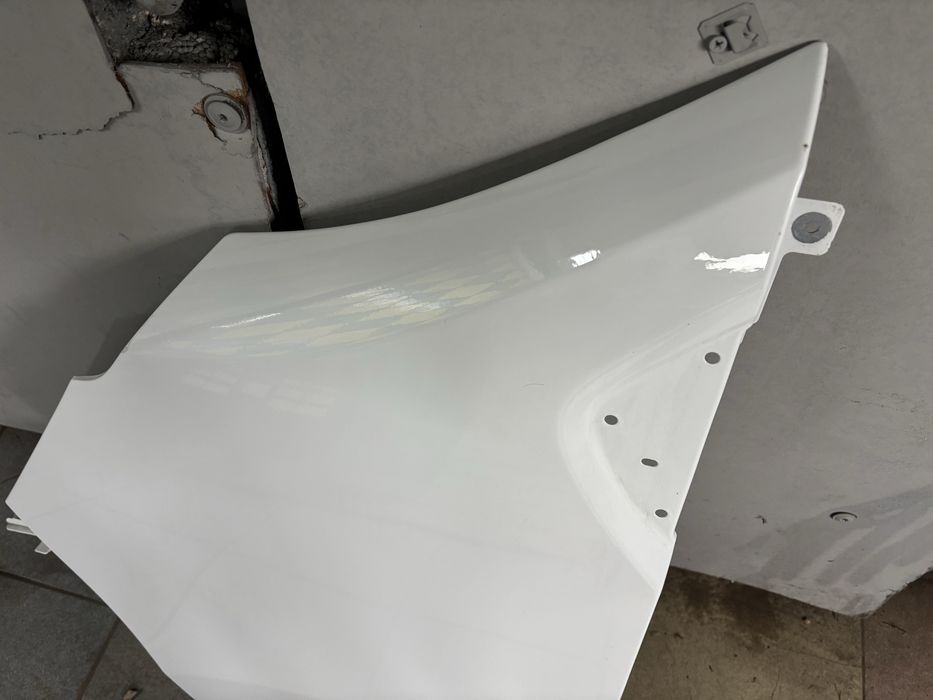 Błotnik lewy Renault Trafic III lift, IV, z mocowaniem