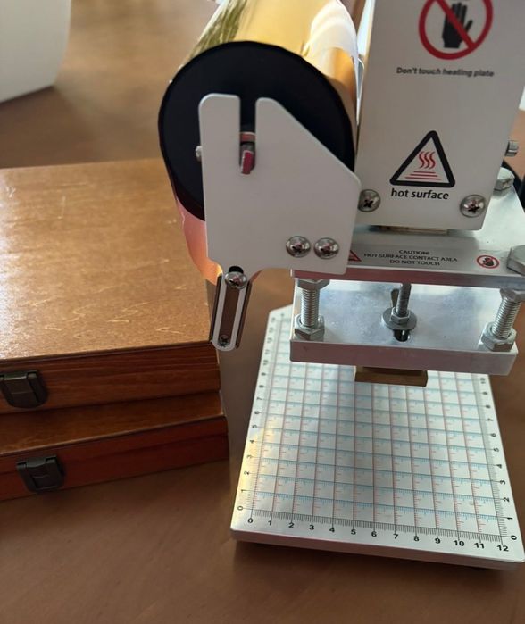 Máquina de gravação a quente