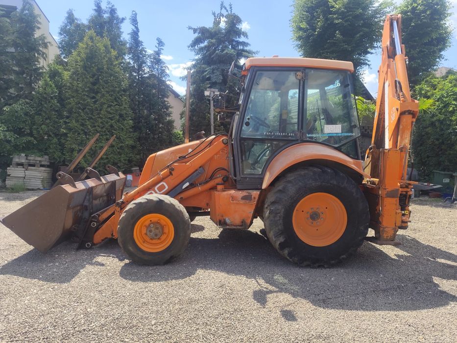 Hitachi fb 100      fiat new holland case komatsu jcb