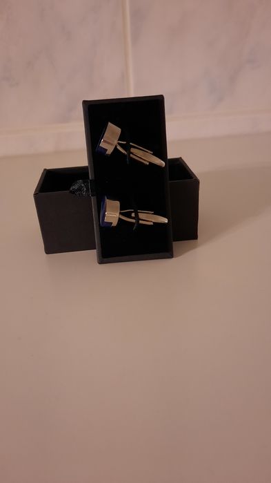 Botões de punho com azul