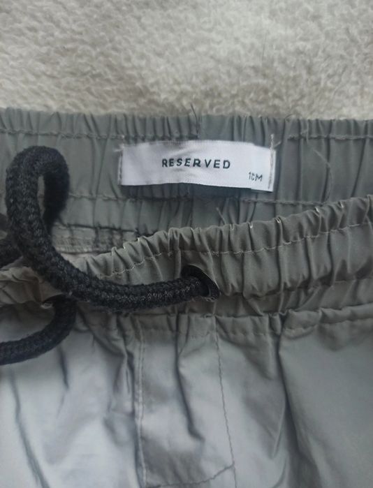 Spodnie przeciwdeszczowe dziecięce Reserved 122-128