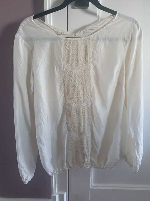 Elegancka bluzka Cristian Berg rozm 38. Wykonana z jedwabiu.