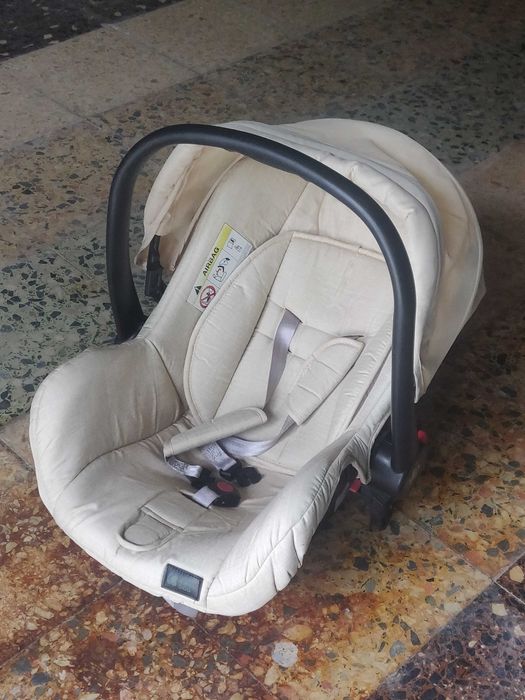 Cadeira de bébe creme
