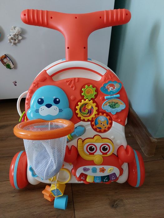 Chodzik pchacz zabawka stolik krab jak nowy