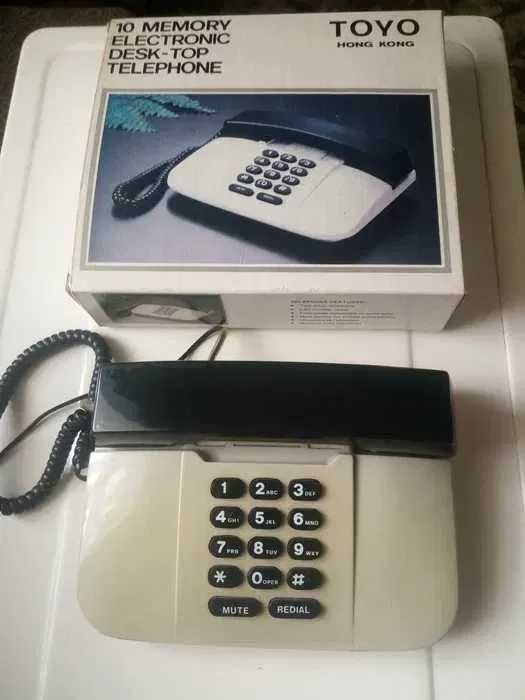 Телефон кнопочный