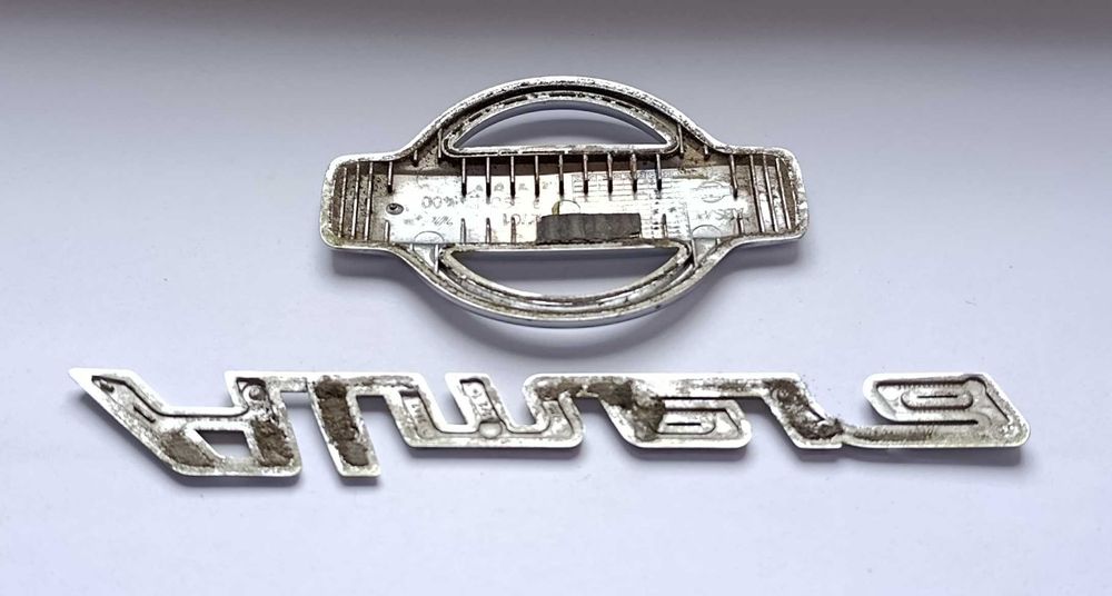 Napis emblemat Nissan Almera 00-03r