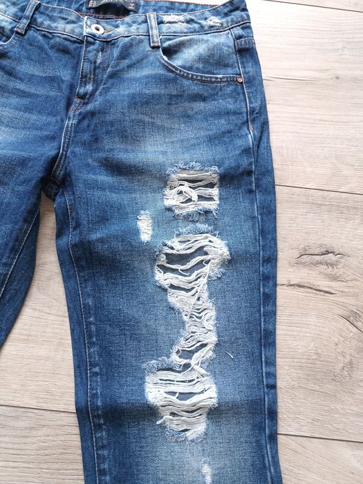 Spodnie jeansy z rozdarciami  Zara TRF r 36