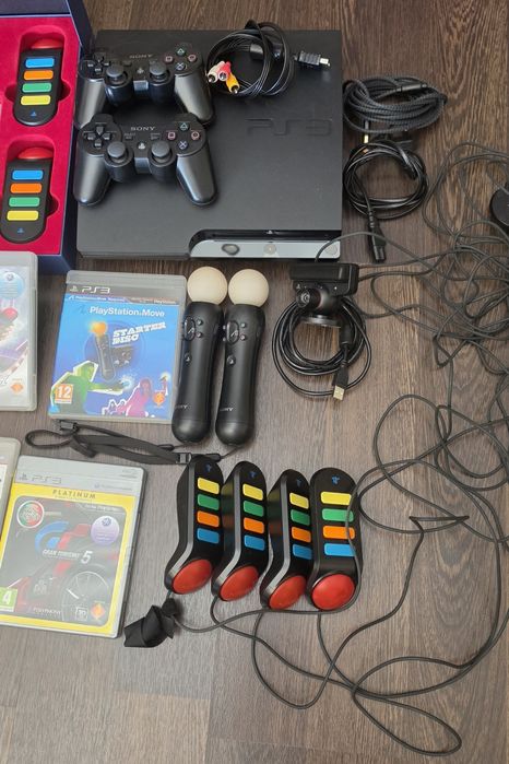 Playstation 3  com 8 Buzz e outros jogos