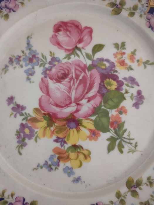 Conjunto de pratos em porcelana "Limoges".
