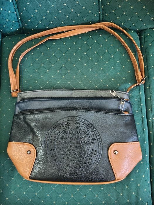 Bolsa nova em couro