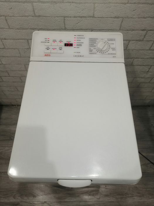 Продам стиральную  машину вертикальной  загрузки AEG