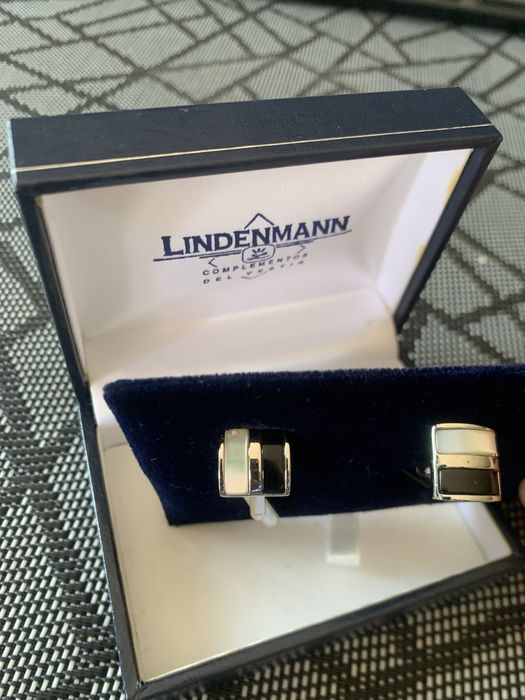 Botões de punho como Novos