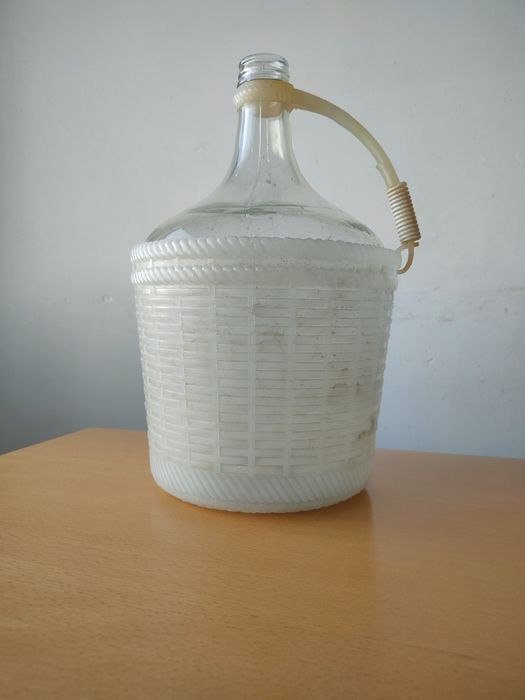 Conjunto de garrafões de vidro vintage.