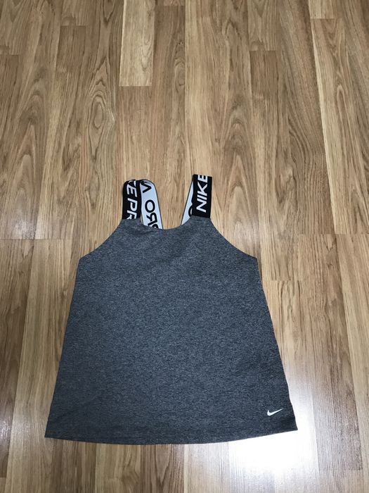 Жіночі спортивні футболки,майки  Nike,Puma,Adidas,Reebok