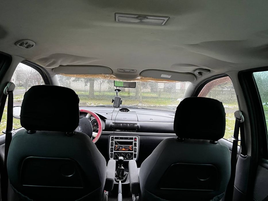 форд гелексі 2001 2.0 газ/бензин