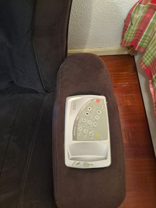 Poltrona de massagem usada.