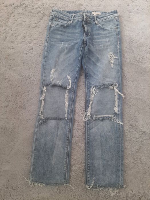 H&M  spodnie jeansowe rozdarcia niebieskie