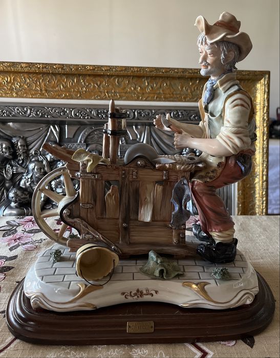 Estatua Marca Época