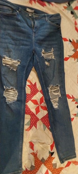 Calça ganga escura rasgada shein