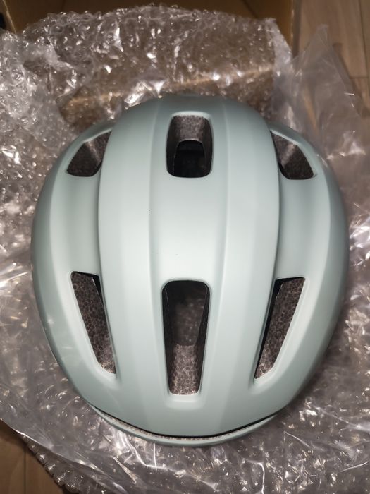 Kask rowerowy seledynowy z lampką