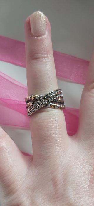 Anel bicolor, em aço, com zirconias. T17