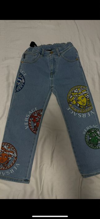 Джинсы на девочку versace