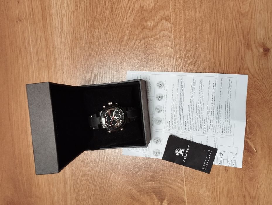 Годинник Peugeot