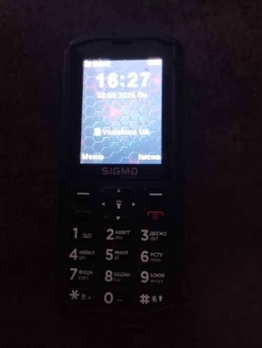 Телефон сигма з фонариком.