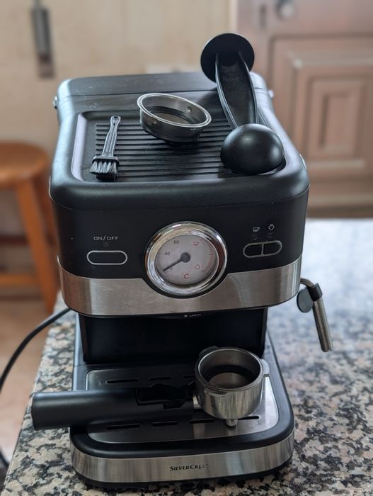 Maquina de café e espuma de leite