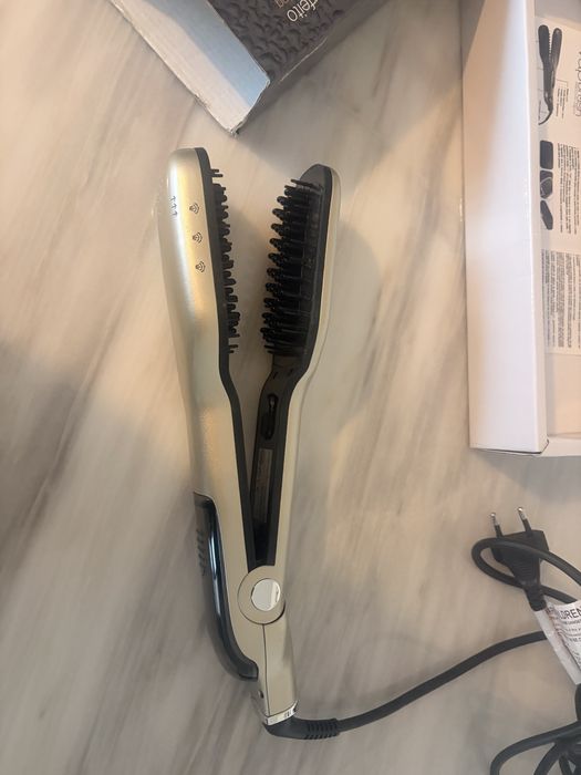 Secador/ alisador de cabelo a vapor