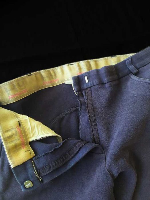 Materiałowe bryczesy L 40 z lejem damskie do jazdy konnej granatowe