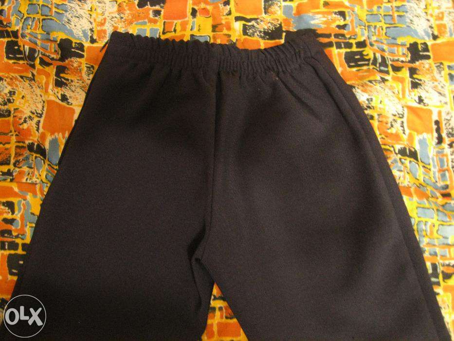 Школьный костюм тройка+брюки.