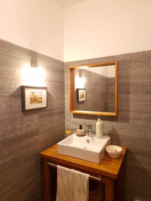 Espelho com moldura de madeira64750809325570122