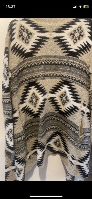 Casaco de malha quente