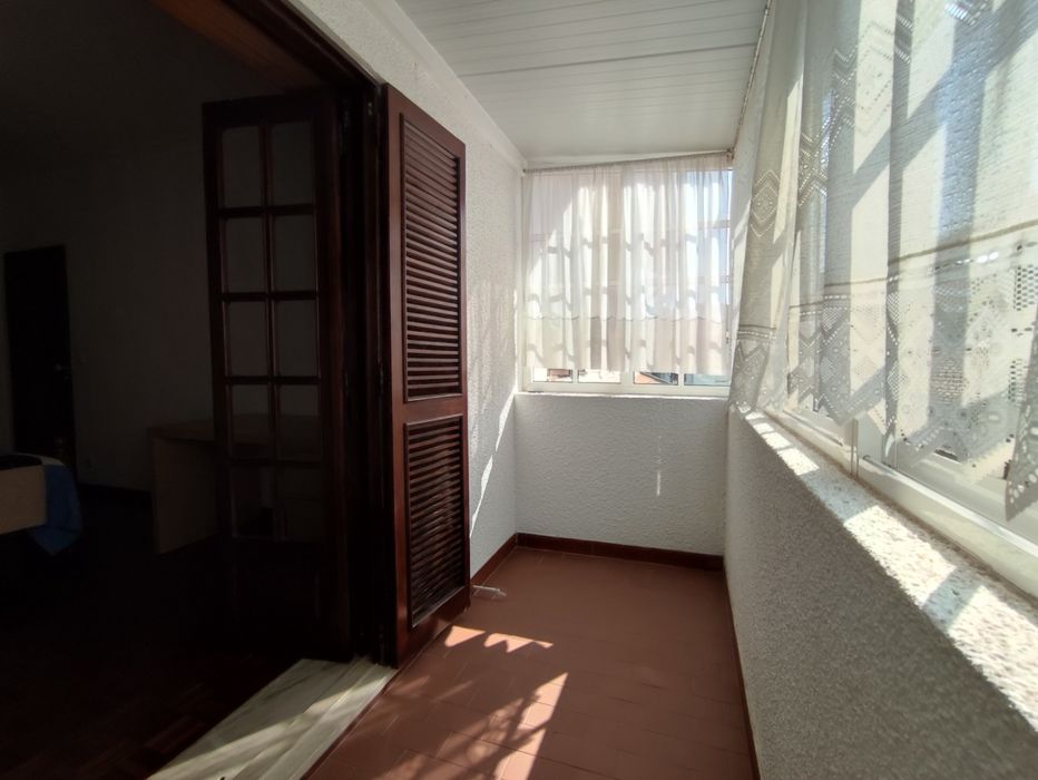 Quarto com Varanda